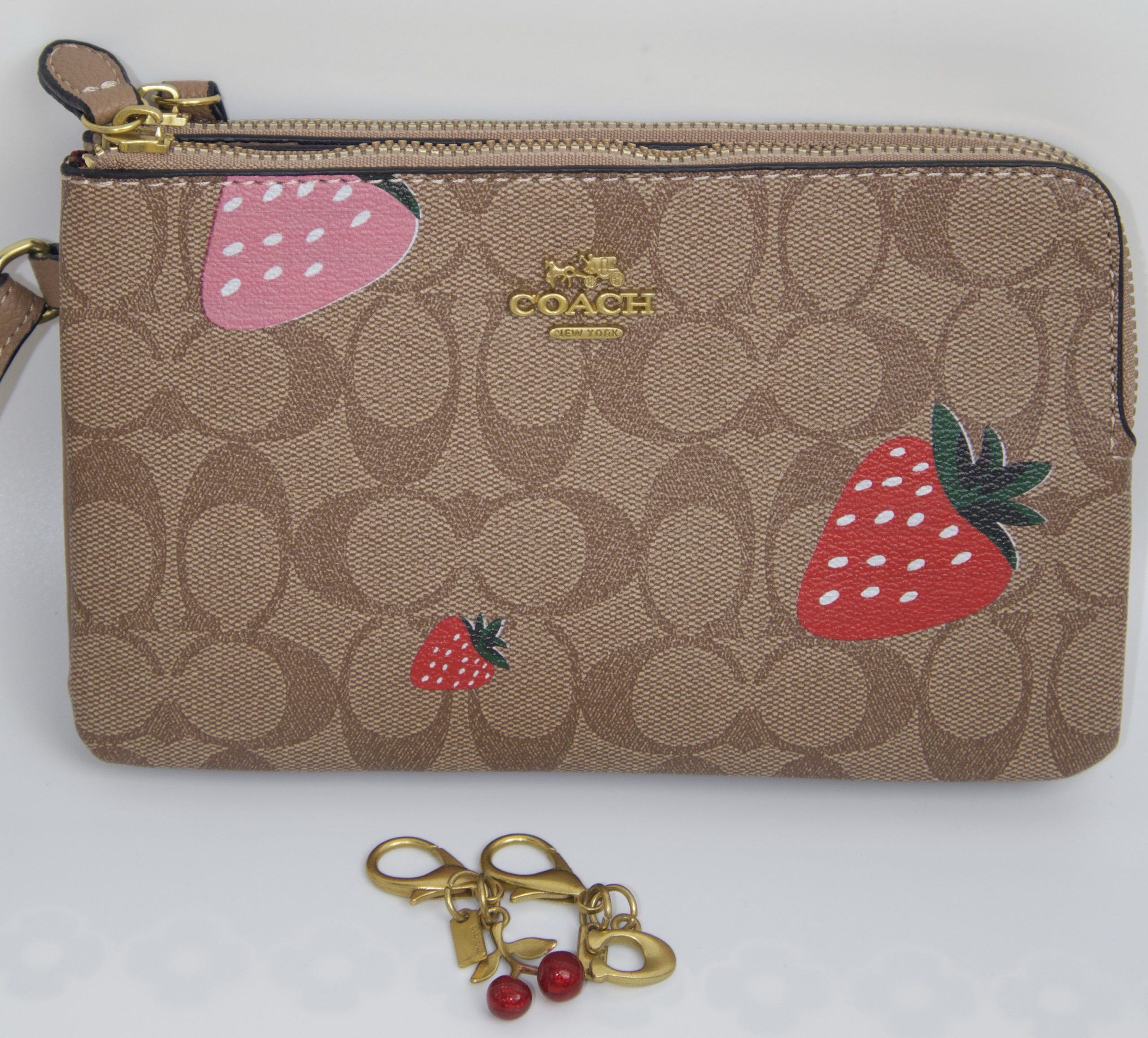 Coach Corner Zip Wristlet with Wild Strawberry Print.
